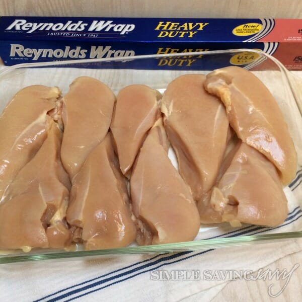 raw chicken breast prepped for oven