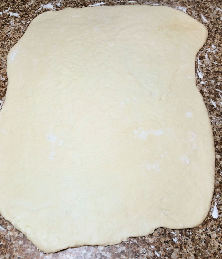 Roll out stomboli dough into a rectangle