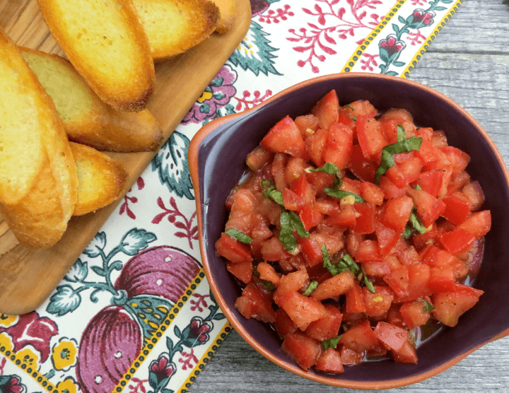 bowl of classic tomato bruschetta with toast points