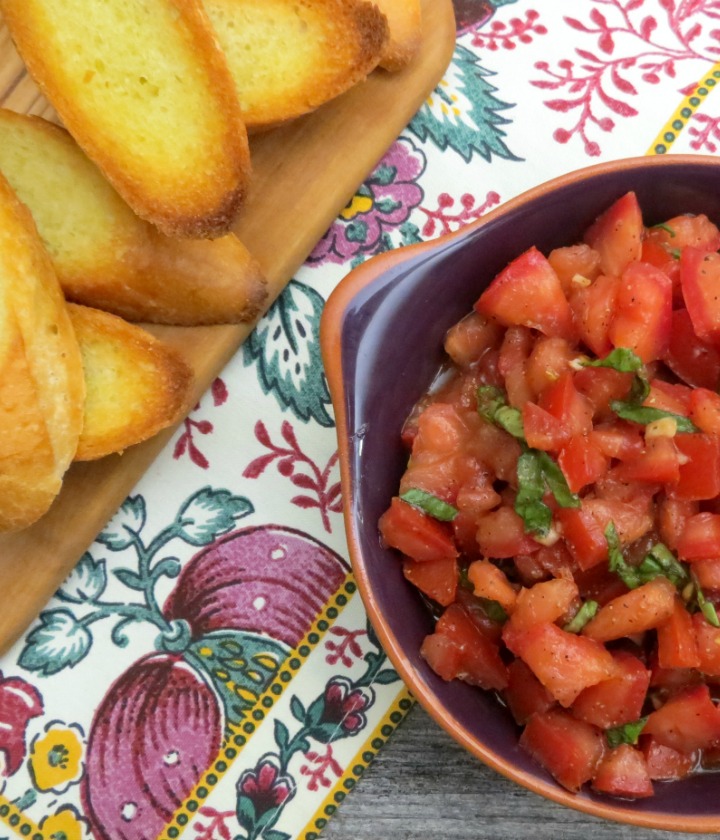 bowl of bruschetta with toast points
